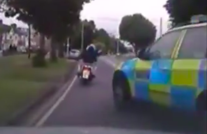 Biker fights off armed moped gang